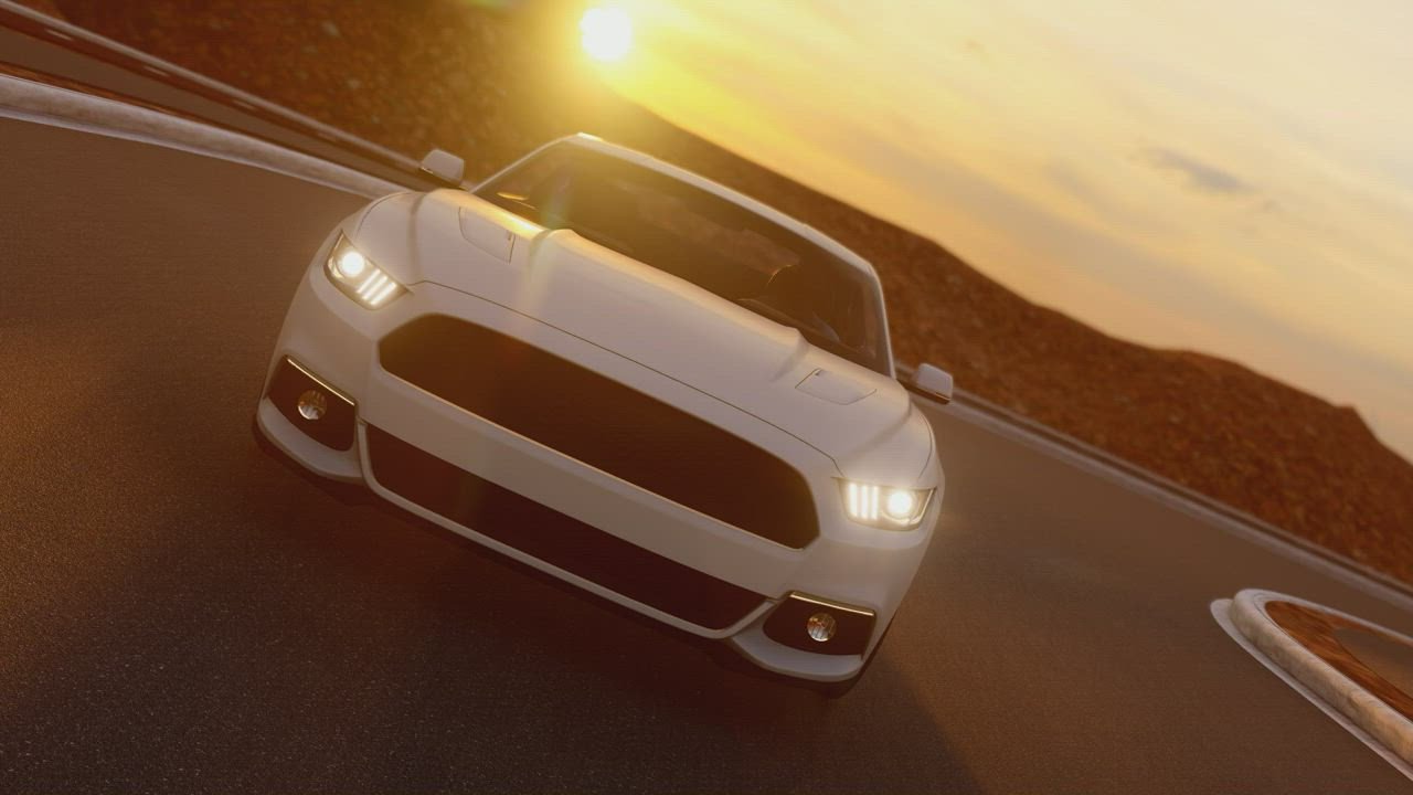 White sports car driving at sunset